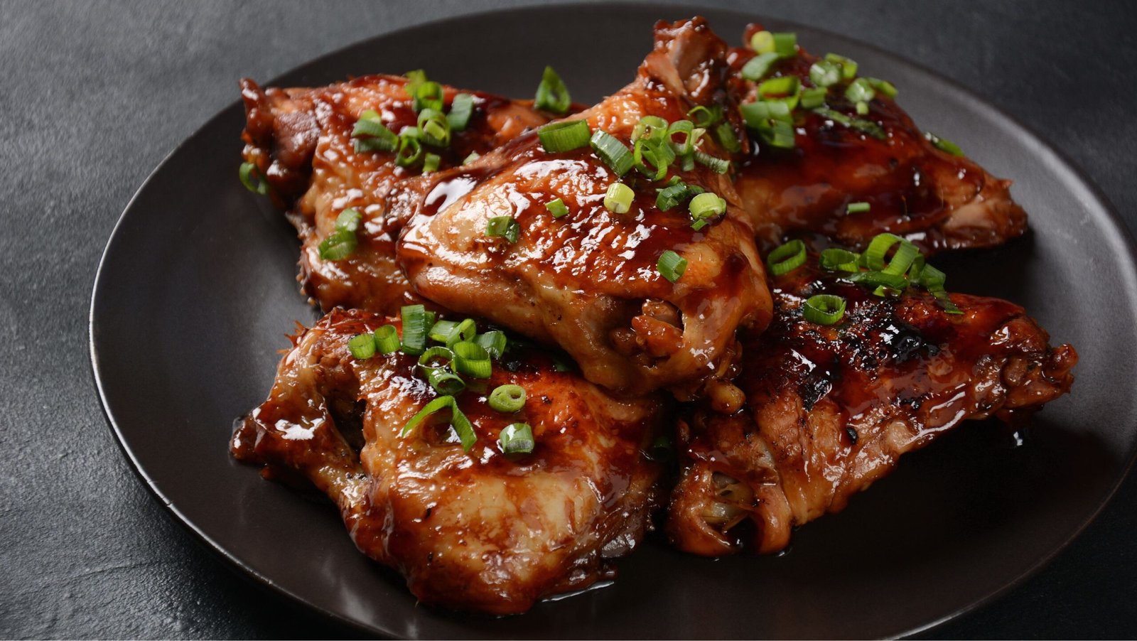 Chicken thighs marinated and cooked in adobo sauce. National filipino dish